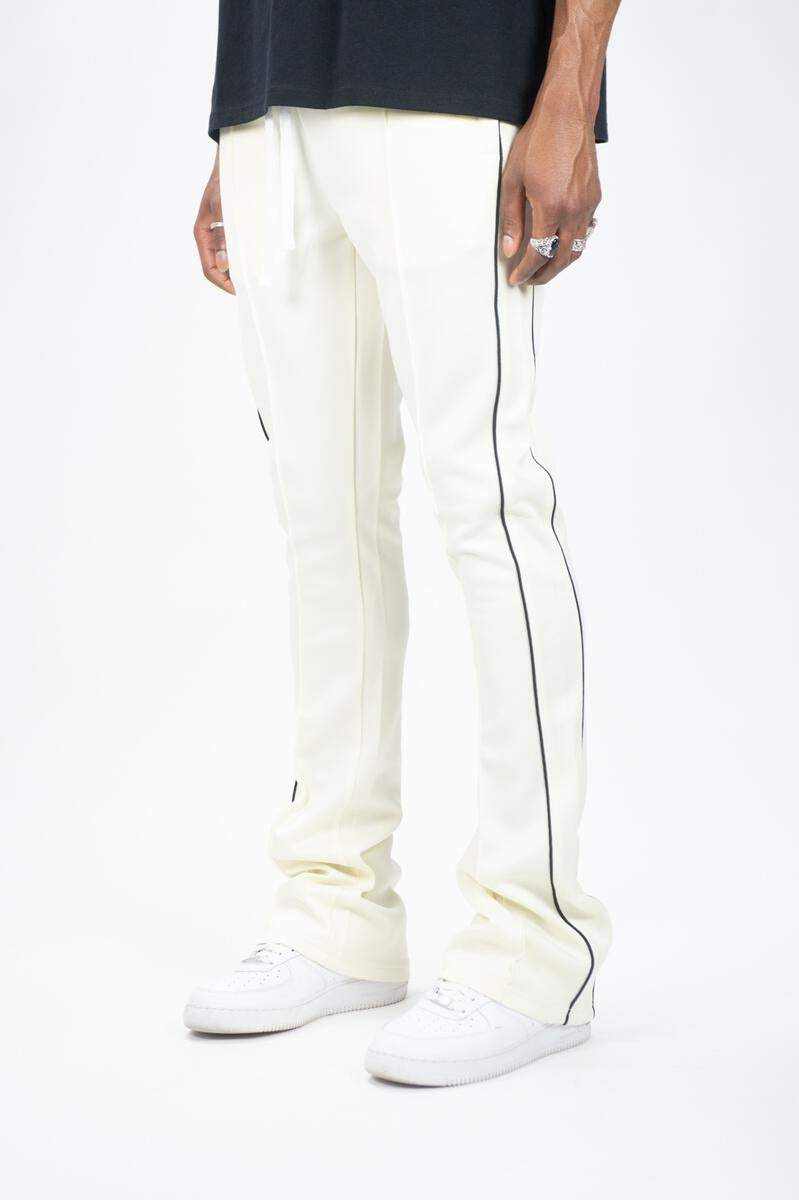 STACKED TRACK PANTS